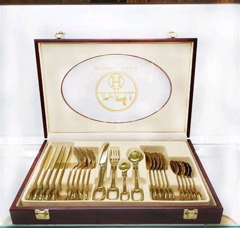 hermes cutlery gold